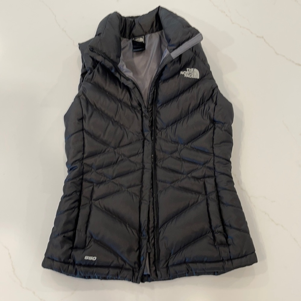 The North Face black 550 puffy vest woman’s xs
